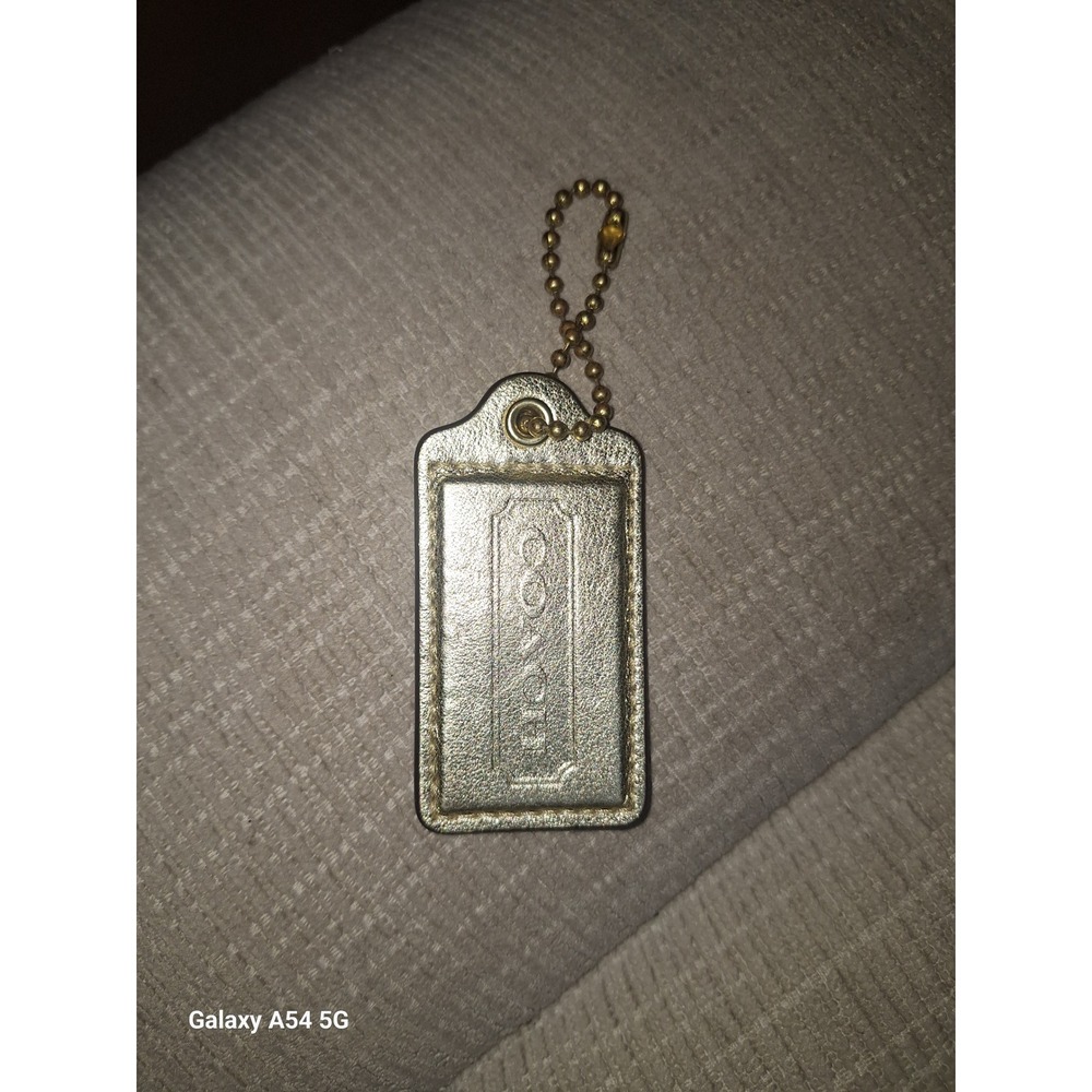 HT22. Coach Metallic Gold Leather Hangtag  Bag Charm Gold Tone Hardware